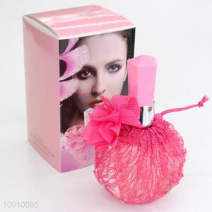 Lady perfume with pink lace glass