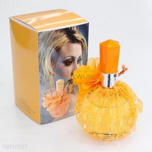 Lady perfume with yellow lace glass