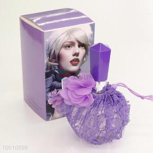 Women perfume with purple lace glass