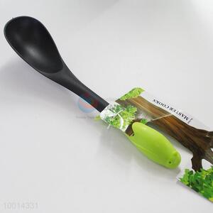 Good quality kitchen spoon with bird-shaped handle