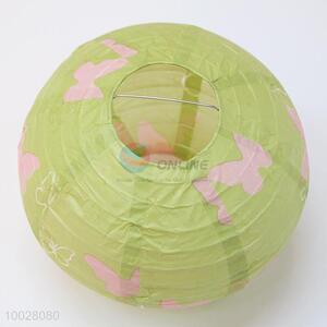 Green round paper lantern with butterfly pattern