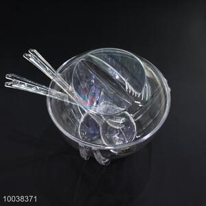 Transparent acrylic salad bowl with spoon
