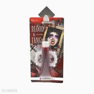 Halloween Face Paint Of Artificial Blood And Tooth