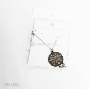 Good quality round flat carved charm necklace