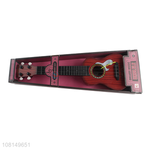 Online wholesale 4 strings children toy ukulele kids mini guitar