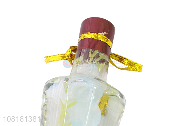 China wholesale creative glass crafts glass bottle with fake flower