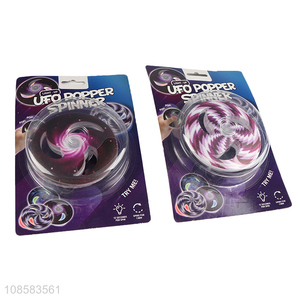 Online wholesale fidget toy glow in dark ufo popper spinner