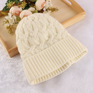 Yiwu market winter knit hats cuffed beanie caps for women
