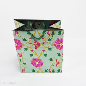 Green flower pattern hologram paper gift bag