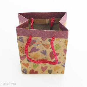Brown paper heart pattern gift bag