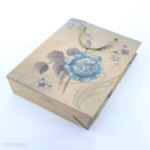 Delicate blue rose kraft paper gift bag