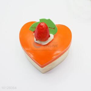 Delicious orange heart shaped cake refrigerator magnet