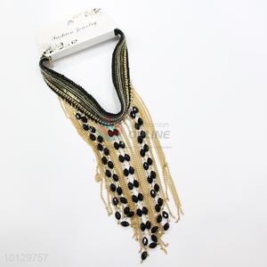 Thin gold chain tessels necklace with black faced beads
