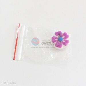 Cute purple flower shaped badge