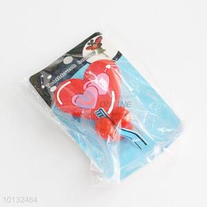 Red heart shaped <em>toothbrush</em> <em>holder</em>