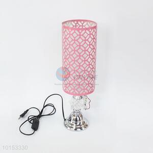 Hotel pink cylinder bedside table lamps