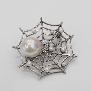 Comfortable spider's web brooch
