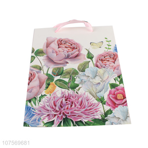 Factory direct sale flower pattern paper gift bag glitter packing bag