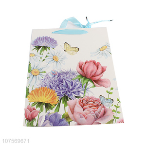 China manufacturer flower pattern paper gift bag glitter present bag