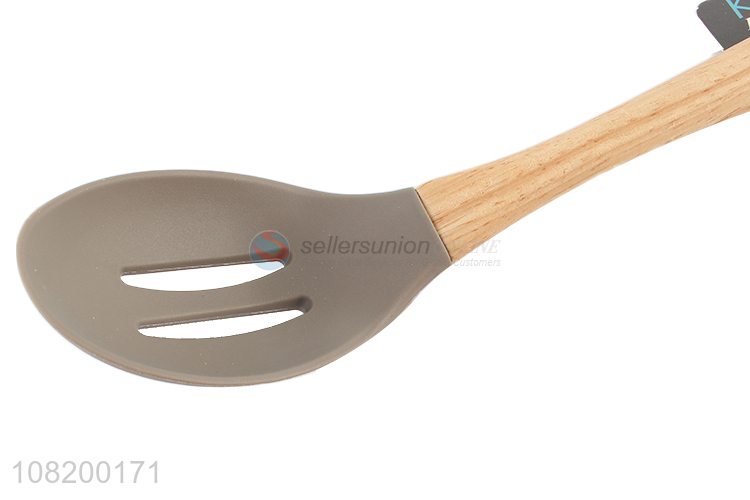 Factory price wooden handle slotted spoon kitchen utensil