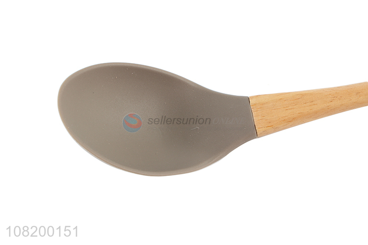 Good wholesale price wooden handle silicone dinner spoon