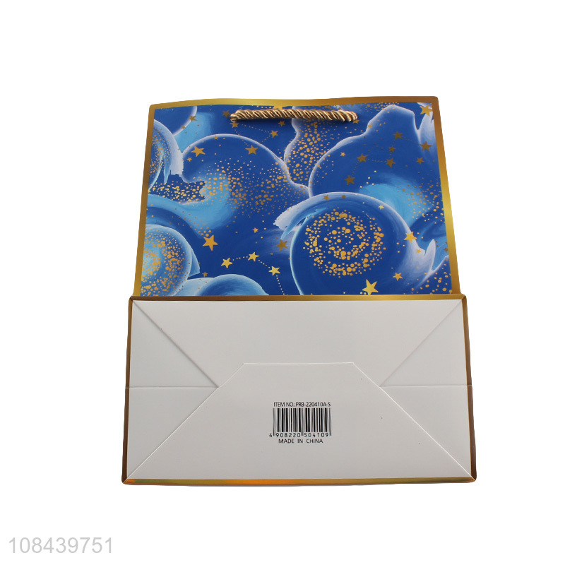 Yiwu direct sale fashion starry sky paper gifts bag