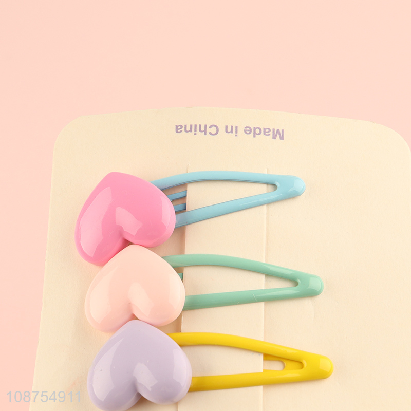 China imports cute candy colored heart shape snap hair clips for girls