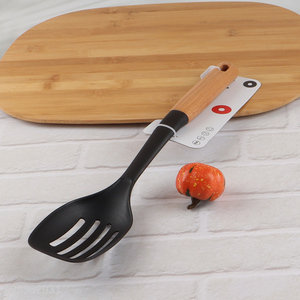 Factory price heat resistant nylon slotted spoon with wooden handle