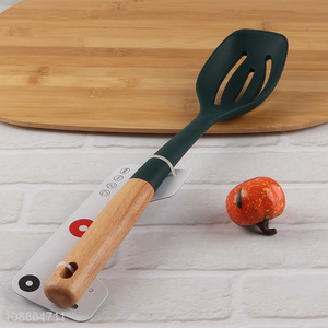 Hot selling heat resistant silicone slotted spoon with wooden handle