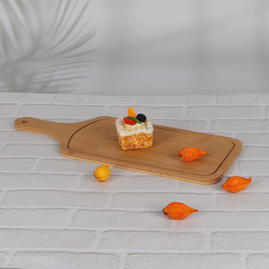 Hot selling multipurpose bamboo pizza plate cutting board with handle