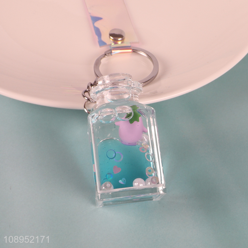 Top selling quicksand bottle decorative keychain wholesale