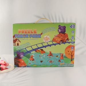 Yiwu market cartoon children puzzle game electric rail car toys for sale